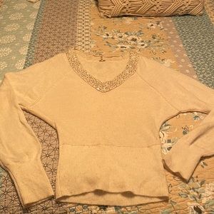 FreePeople sweater size medium. Cream
